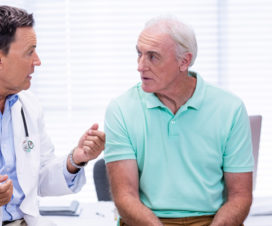 Image of elderly man having trouble hearing