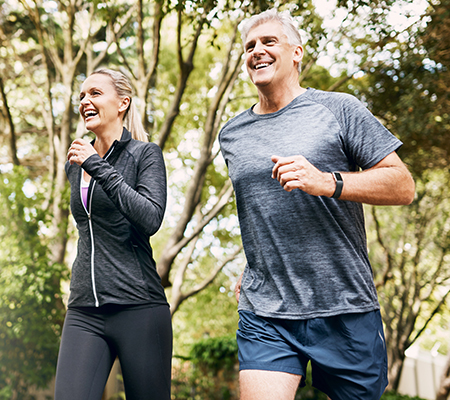 Image of man and woman running
