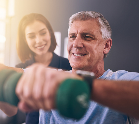 Image of physical therapy patient working with therapist