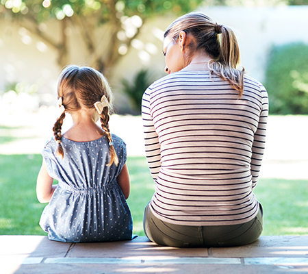 Image of mother talking to her daughter
