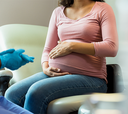 Graphic of pregnant woman holding her belly